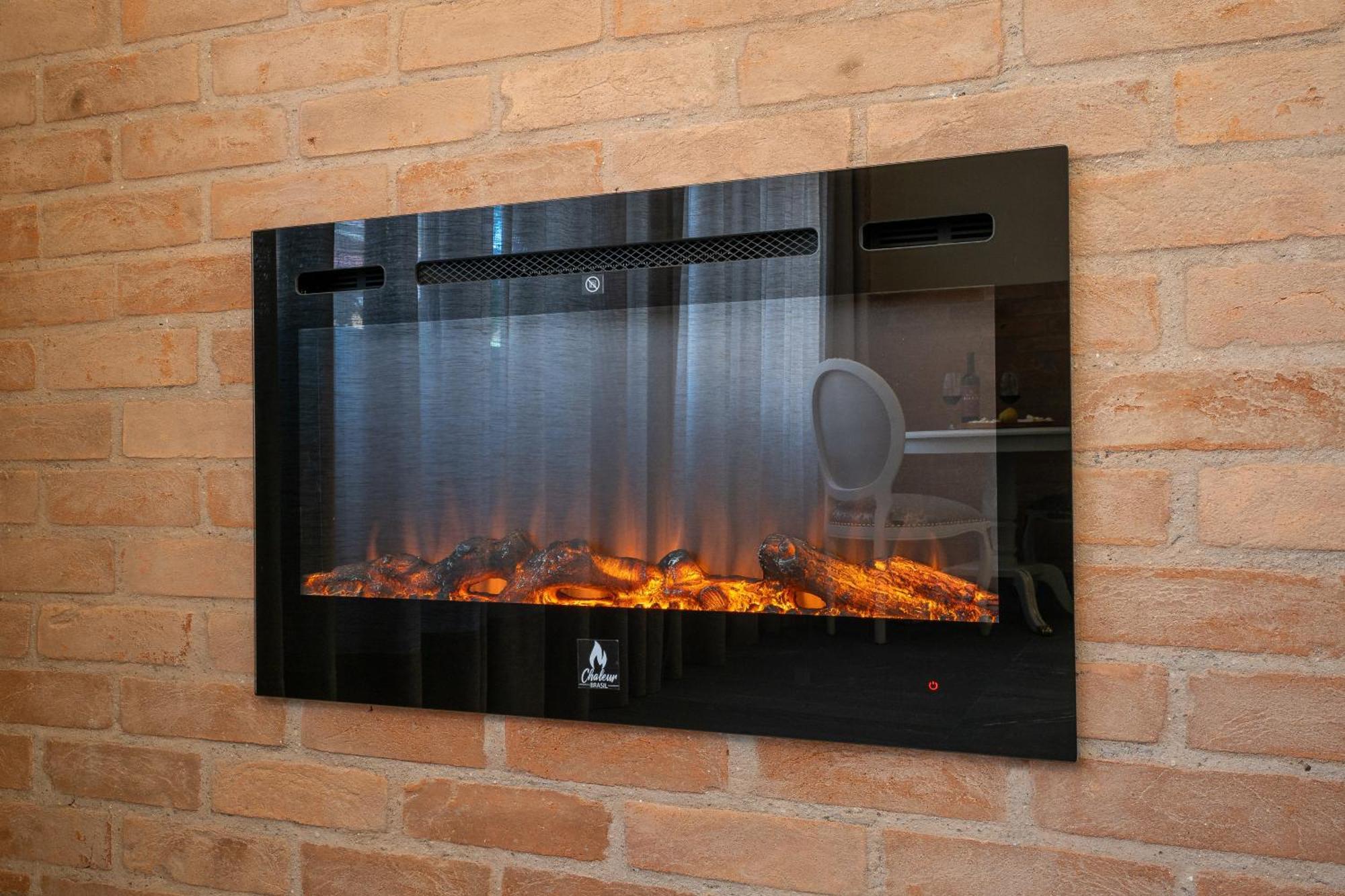 Pousada Luis XV Campos do Jordao Bagian luar foto A wall mounted electric fireplace