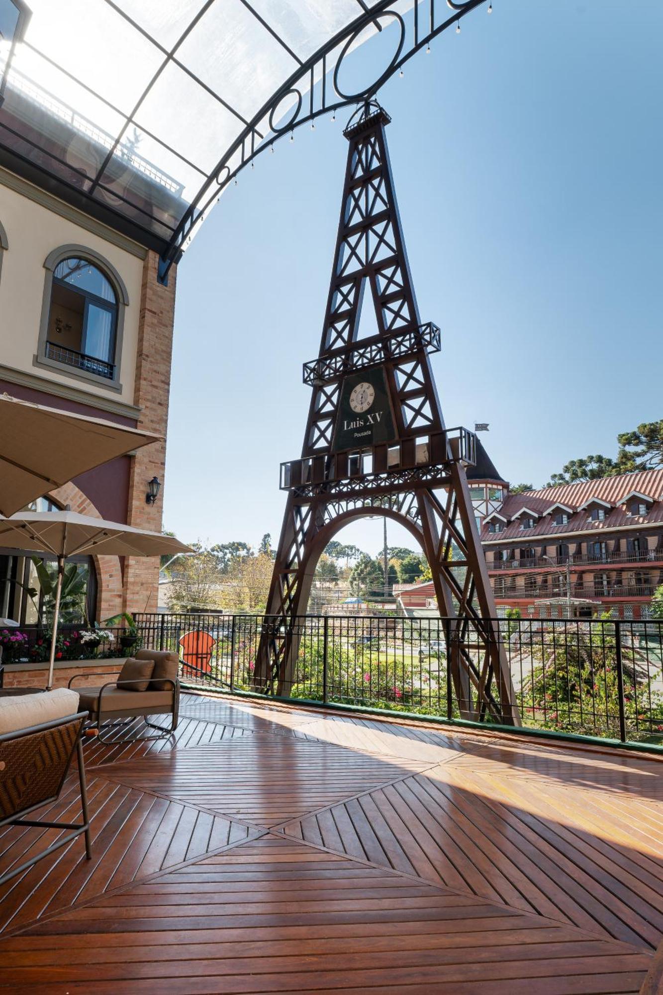 Pousada Luis XV Campos do Jordao Bagian luar foto The Eiffel Tower at the French village