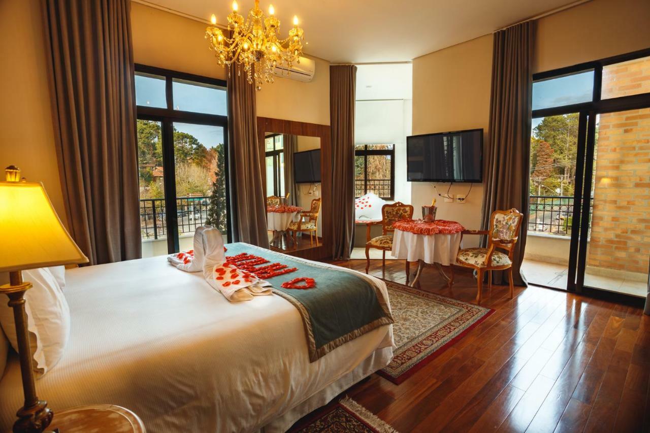 Pousada Luis XV Campos do Jordao Bagian luar foto A bedroom at the hotel